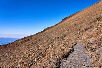 Landscape on the peak of a volcano with a view of a large slope. Stony and porous rock of the old...