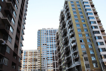 Fototapeta premium apartment building. new modern apartments of high-rise buildings in the city. 