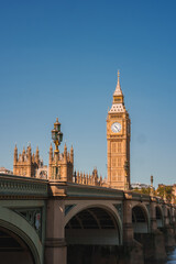 Fototapeta na wymiar Big Ben, Westminster Bridge on River Thames in London, the UK. English symbol. Lovely puffy clouds, sunny day