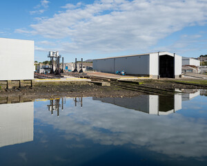 30 July 2023. Buckie,Moray,Scotland. This is the site of Buckie Shipyard being reflected on very...