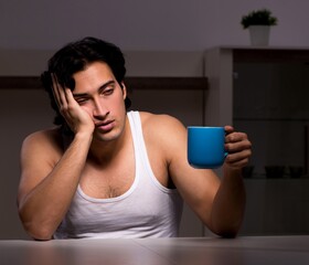 Young man suffering at home night time