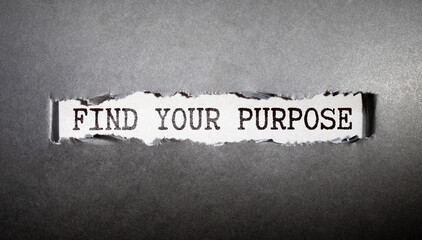 Text DISCOVER YOUR PURPOSE on a Office desk table with keyboard, notepad and analysis chart on...
