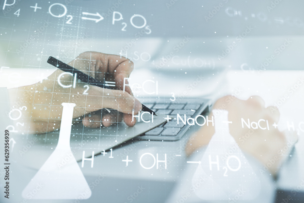 Poster double exposure of creative chemistry concept with hand writing in notebook on background with lapto
