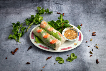 spring asiatic rolls on a plate - 629360521