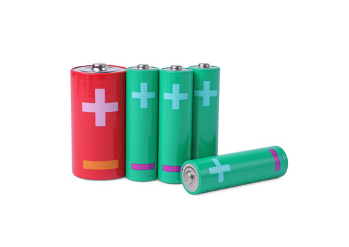 New AA and C size batteries isolated on white
