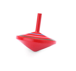 One bright spinning top isolated on white. Toy whirligig