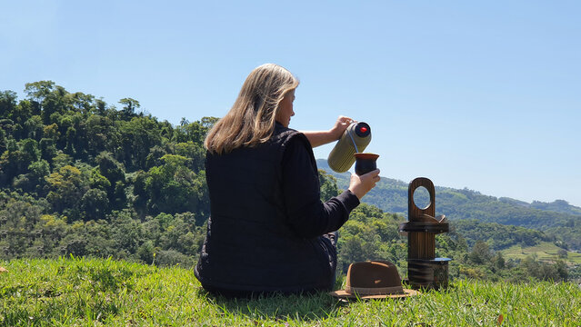 Person drinking chimarrao. Typical drink of the gaucho people, southern Brazil.