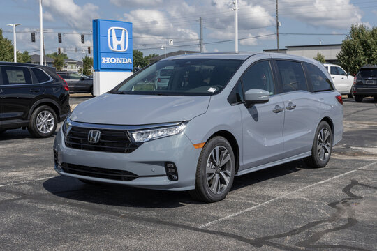 Honda Odyssey Touring display at a dealership. Honda offers the Odyssey in EX, EX-L, Sport and Touring models.
