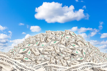 Bunch of dollars. Wrinkled money. Big pile of one dollars bills. Money under blue sky. Metaphor for...