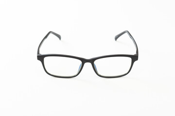 Fototapeta premium 白背景に黒縁のメガネ