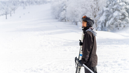 Portrait of Asian man athlete practice skiing on snow mountain at ski resort. Handsome guy enjoy and fun outdoor active lifestyle travel nature and winter extreme sport training on holiday vacation.