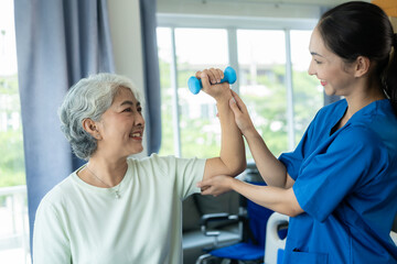 Fototapeta premium Asian women were cared for by nurses who tracked their health and musculoskeletal, shoulder and mental physiotherapy for elderly women.