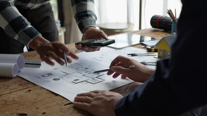 Architecture Engineer Teamwork Meeting, Drawing and working for Architectural projects and engineering tools in the workplace, working ideas on architectural structures.