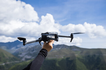 Flying drone in high altitude mountains