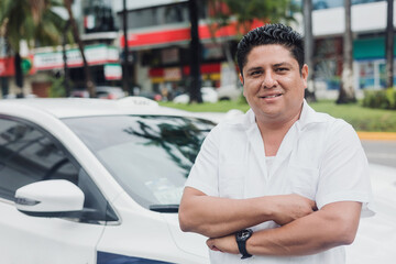 latin taxi driver man with car on background at city street in Mexico in Latin America, Hispanic people