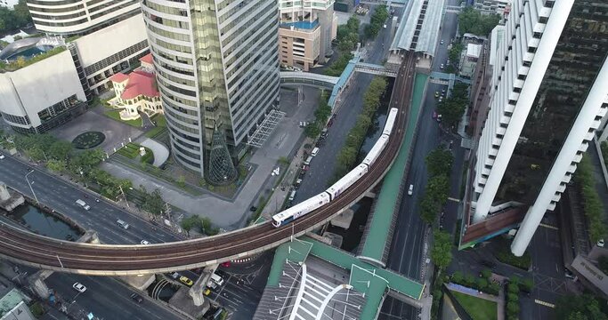 Aerial view of Bangkok modern office buildings and BTS skytrain in Bangkok city downtown urban in Bangkok, Thailand