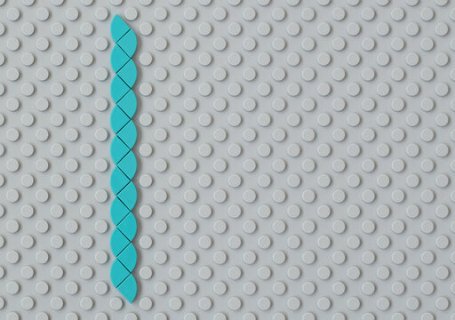 Lego gray baseplate with rows of round knots to assembly plastic bricks from popular toy brand. Editorial illustrative image of popular children plastic toy.