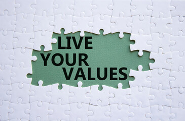 Live your values symbol. Concept words Live your values on white puzzle. Beautiful grey green...