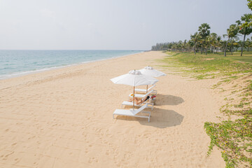 beach chairs and umbrella