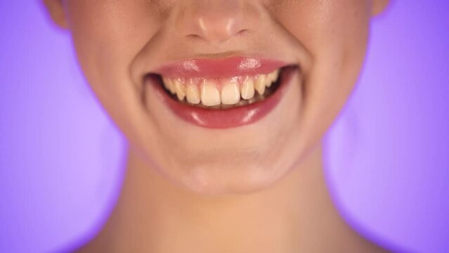 Gorgeous young east European caucasian woman smiling at camera, close-up face