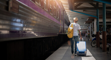 Traveler waits train at train station