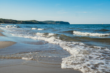 Baltic sea Dark blue clouds and sea or ocean water surface with foam waves before storm, dramatic seascape background. Incredible sunsets. Abstract natural pattern texture.