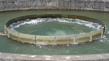 Akita, Japan - July 29, 2023: Circular Tank Diversion for agricultural use in Misato, Akita, Japan
