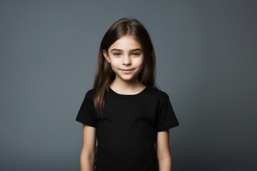 Obraz premium Cute fictional little child in plain black t-shirt. Generative AI.