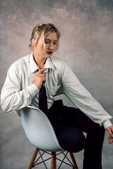 Portrait female glamor elegant powerful fashion business woman model in black suit