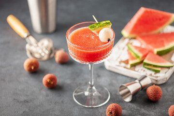 Cold watermelon lychee cocktails  in martini glasses. Summertime refreshment.