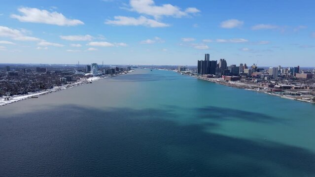 Detroit River - Downtown Detroit in Michigan USA on the right, Windsor Canada on the left.