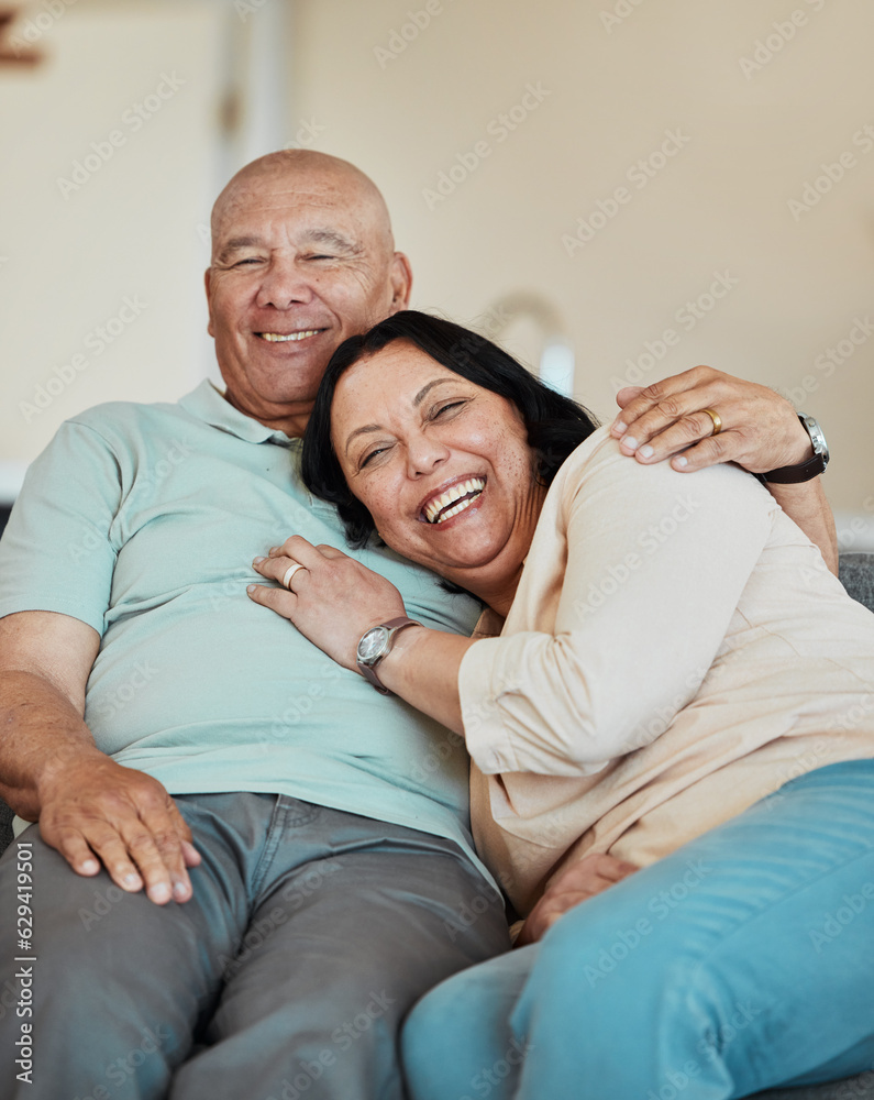 Poster Funny, portrait and senior couple in home living room, bonding and relax together for retirement. Face, laughing and elderly man and woman hug on sofa in lounge, smile and happy in house with love