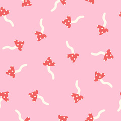 Fly agaric on a pink background seamless pattern.  - 629433942