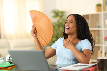 Stressed black student suffering heat stroke at home