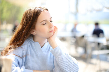 Customer relaxing in a restaurant terrace