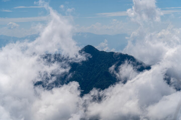 Mountain peak covered by the sea of cloud in northern of thailand (Nan province, Thailand) เด่นช้างนอน
