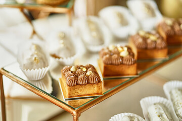 Sweet cookies with icing on the buffet table.
