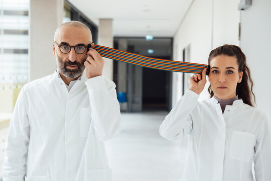 Scientists pretending to connect with computer cable