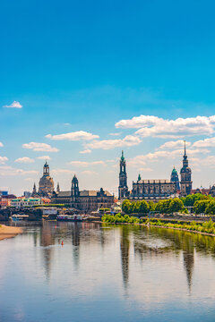 Dresden, Germany. Cover page with old city historical downtown, Elbe river at hot summer day at sunset
