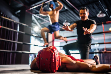 Two young professional boxer having a competition tournament on stage. 