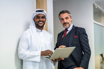 Portrait of diverse attractive businessman working in office workplace. 