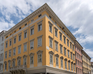 Fototapeta na wymiar colorful corner building at Teresiano district, Trieste, Friuli, Italy