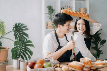 Asian couple joking around, couple, leisure activities.