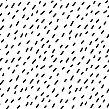 Abstract seamless pattern with small black lines. Vector illustration of specks. Monochrome background with randomly located asymmetric spots. Texture with cartoon rain or snow.