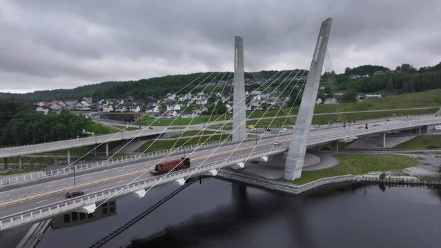 Vehicles Driving Over Farris Bridge Crossing The Farris Lake, North of Larvik, Norway. Aerial Drone Shot 
