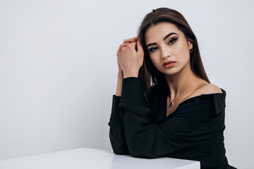 Close up fashion portrait of young pretty indian latin american woman posing in photo studio on white background. Hispanic lady, skin care, solarium, make up, cosmetology
