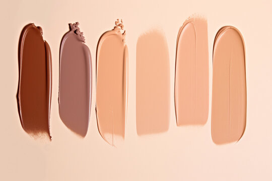 Swatches of liquid foundation makeup in different skin shades