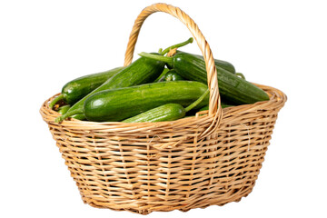 Fresh cucumber in a wicker basket over wooden background. Cucumber harvest season concept. Vegetables for a healthy diet