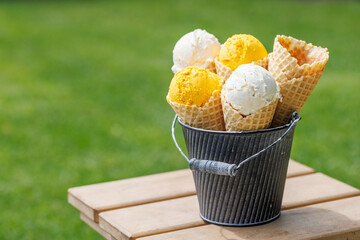 Assorted ice cream flavours in delightful waffle cones