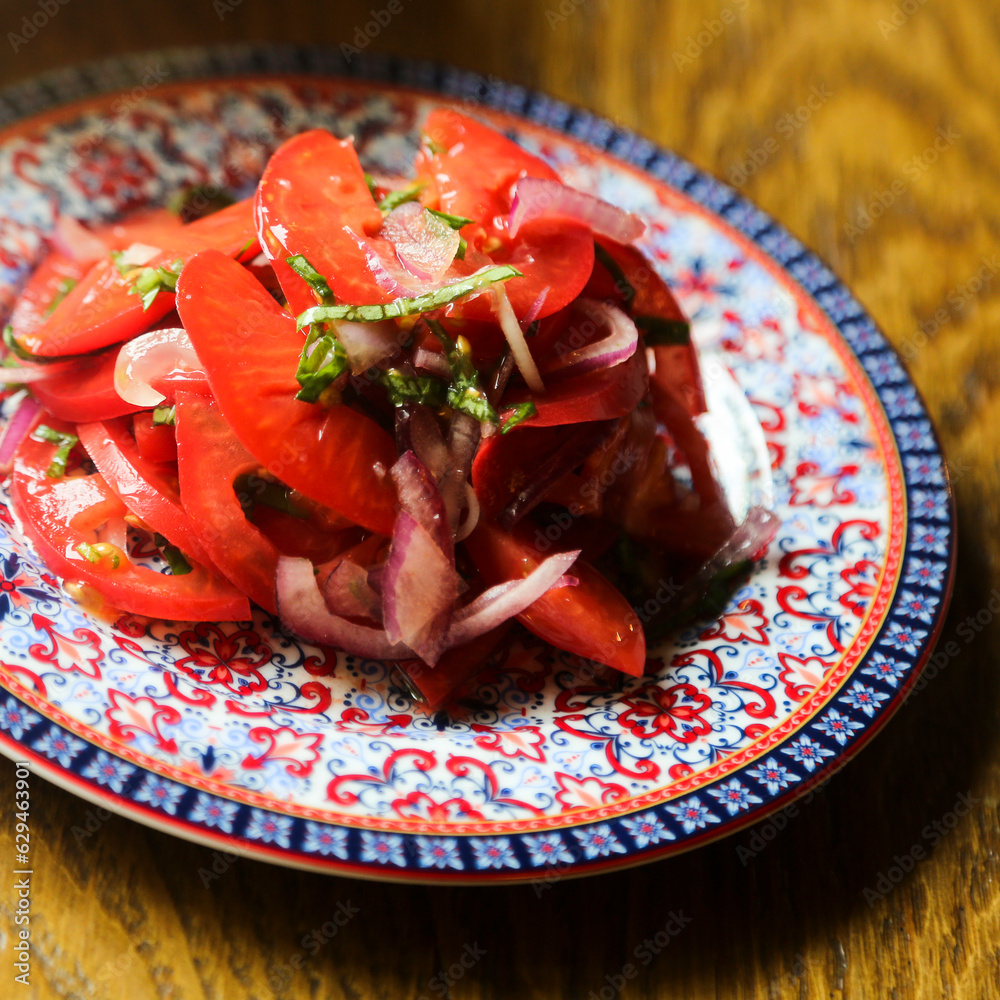 Sticker traditional tomato salad with onion